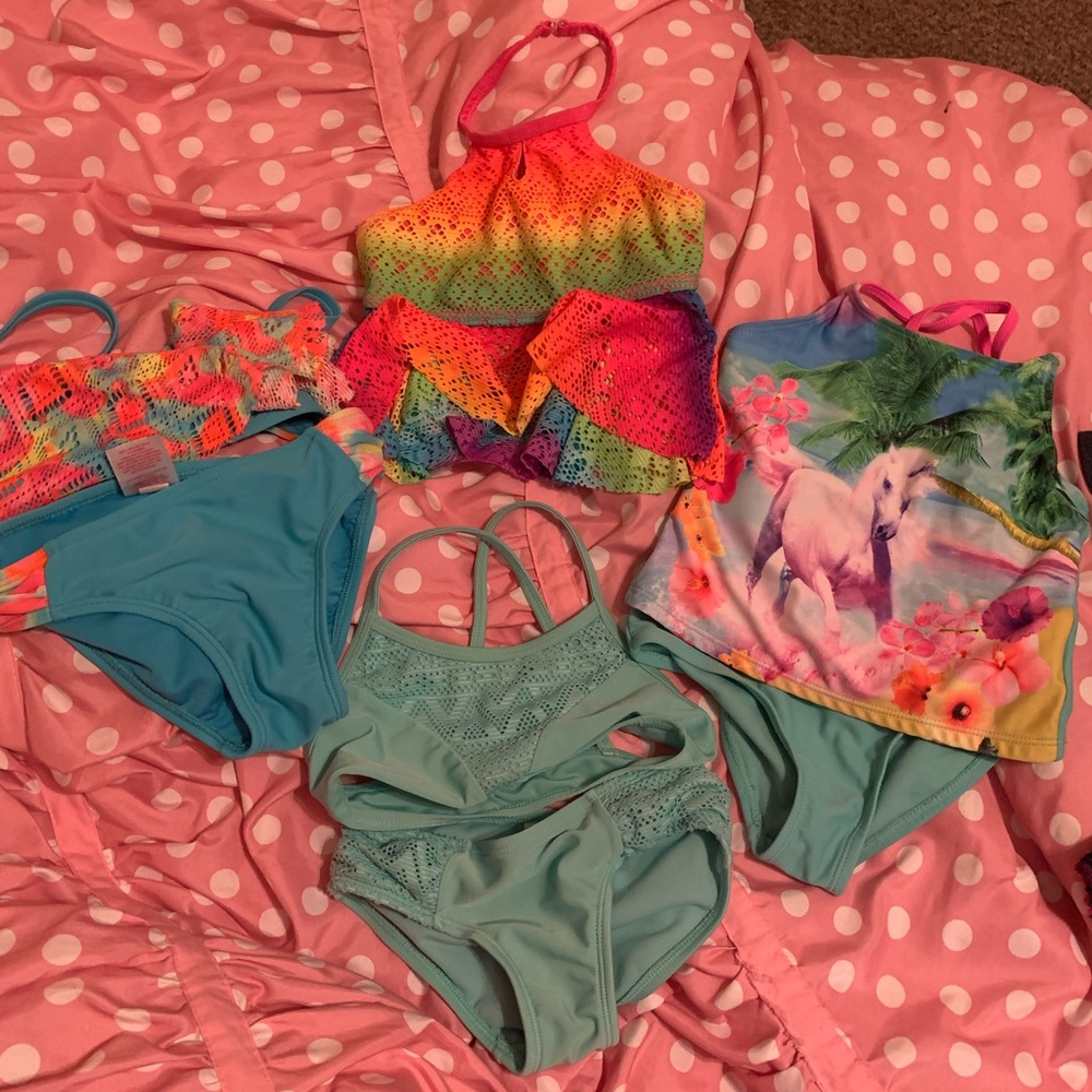 Bundle of girls swimsuits. Sizes 4/5 and 5. Good used condition.